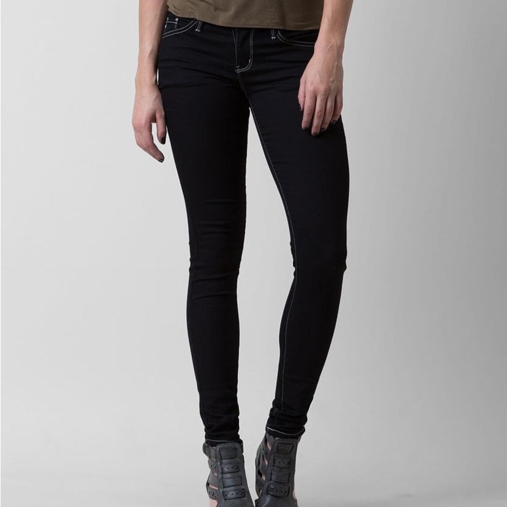 KANCAN low rise skinny 28 with stretch. Almost a black color very dark blue.